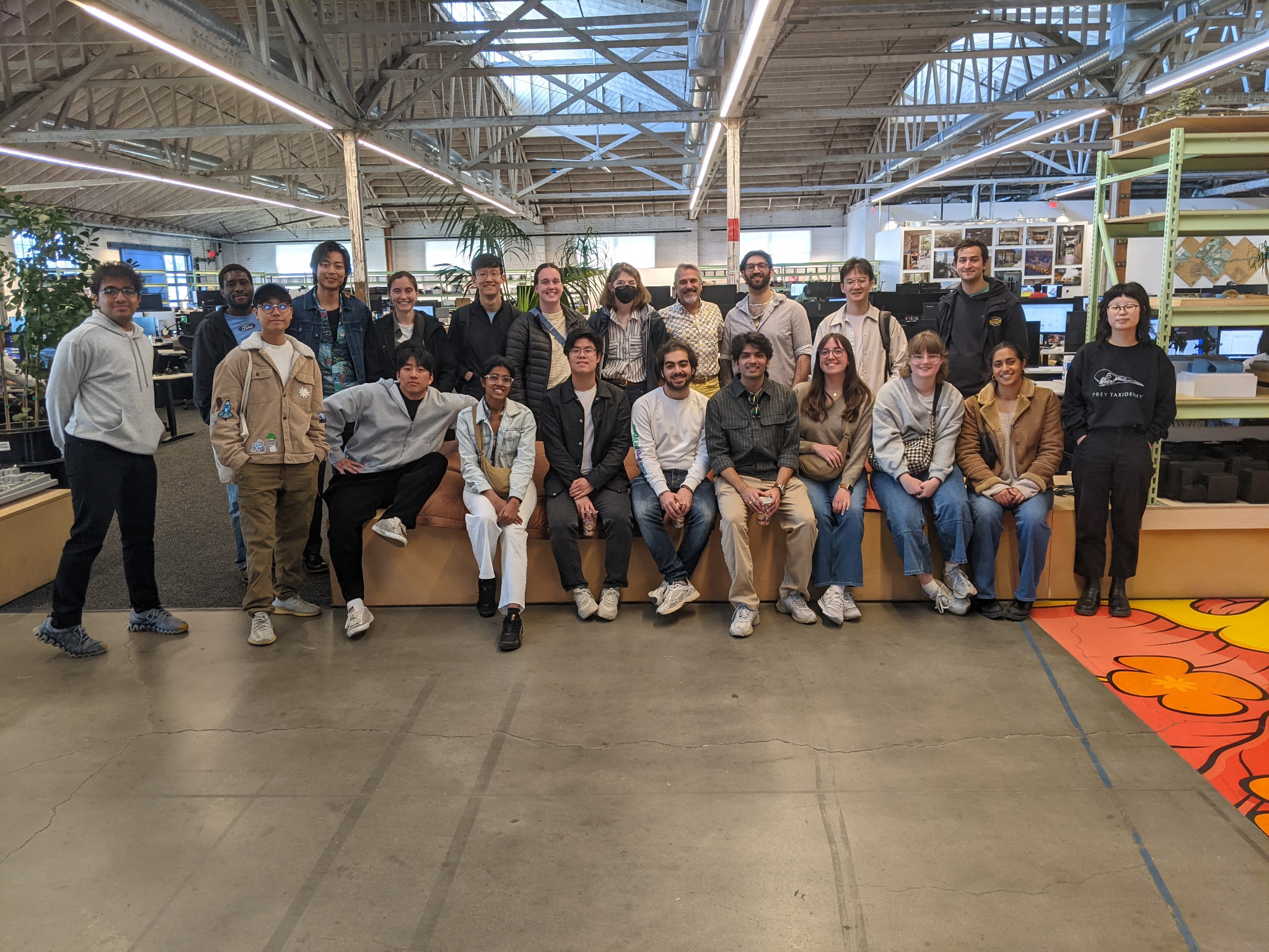 a large group of students poses for a photograph