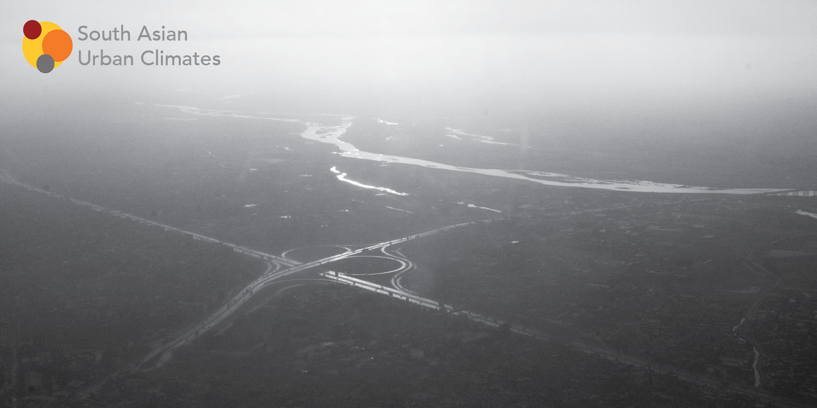 black and white image of a river from afar