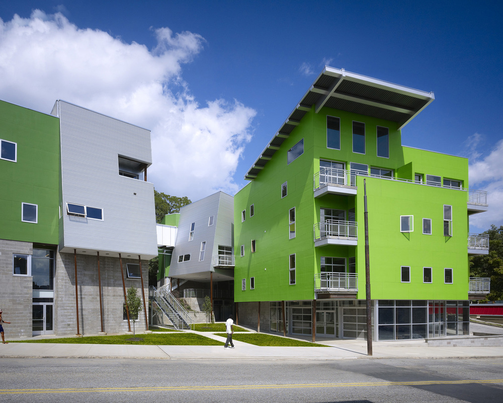Glass Lofts (2007), a mixed-use building published in "ArchDaily."