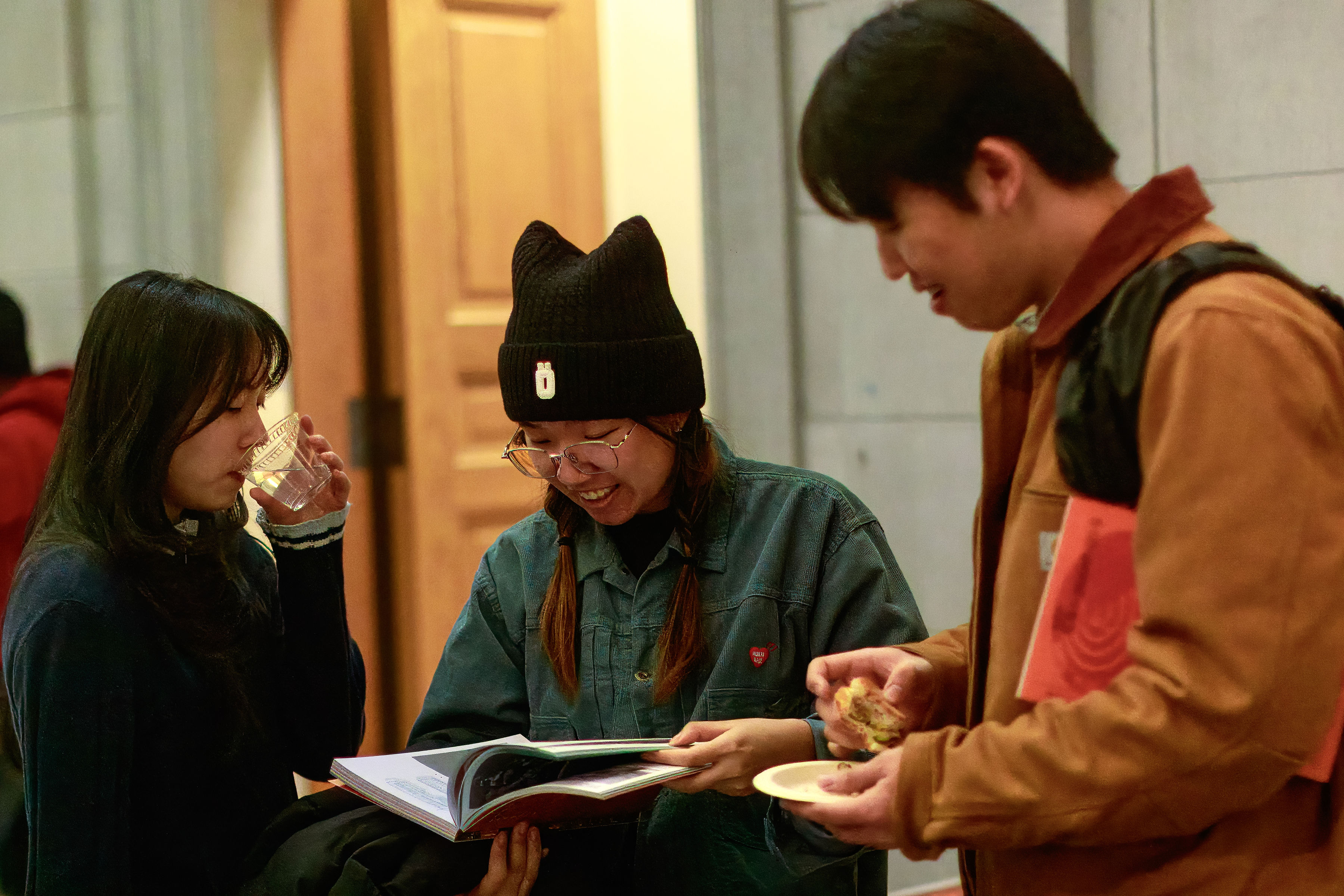 students admire a book