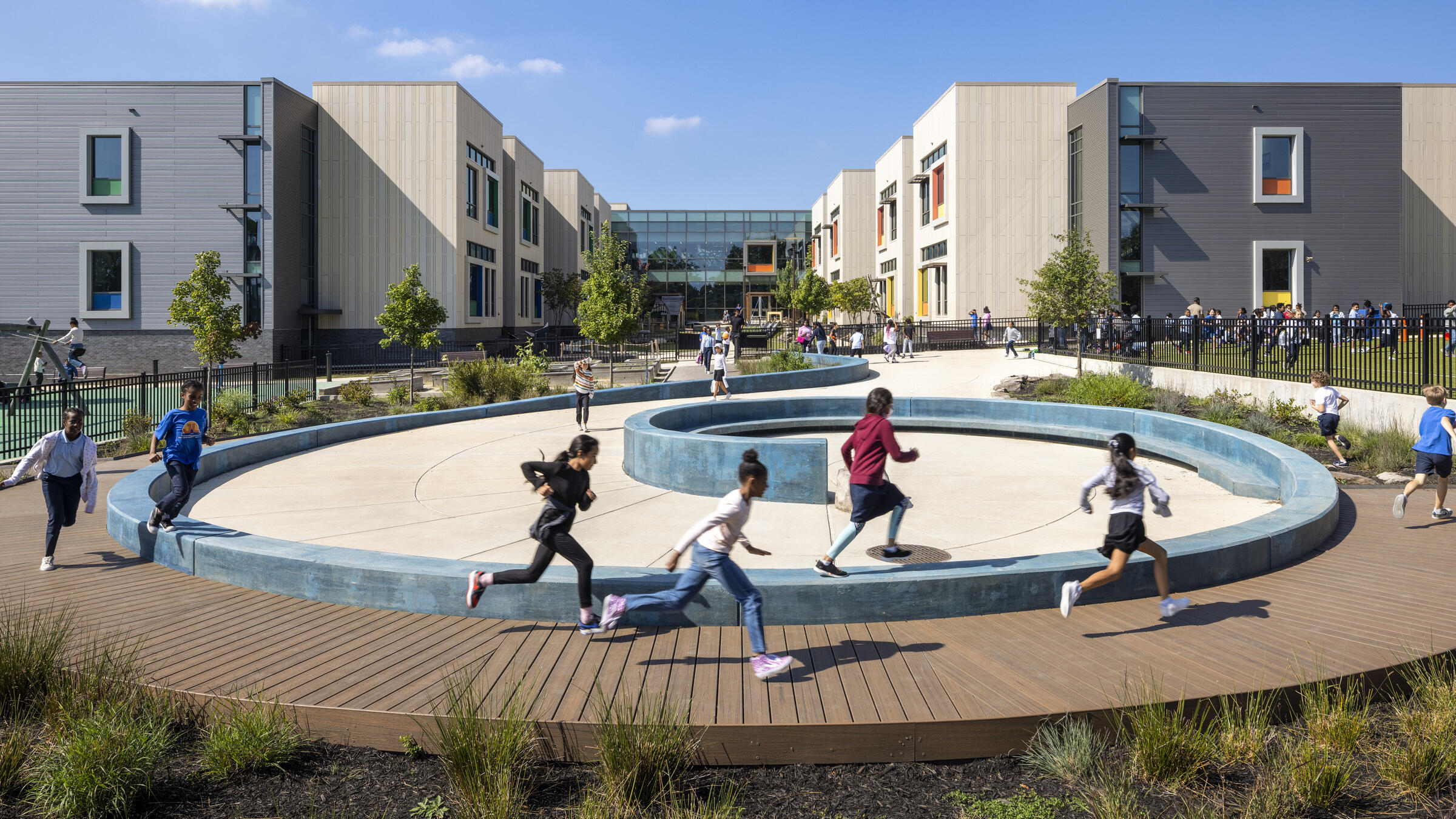 Children play on a playground at John Lewis Elementary School.