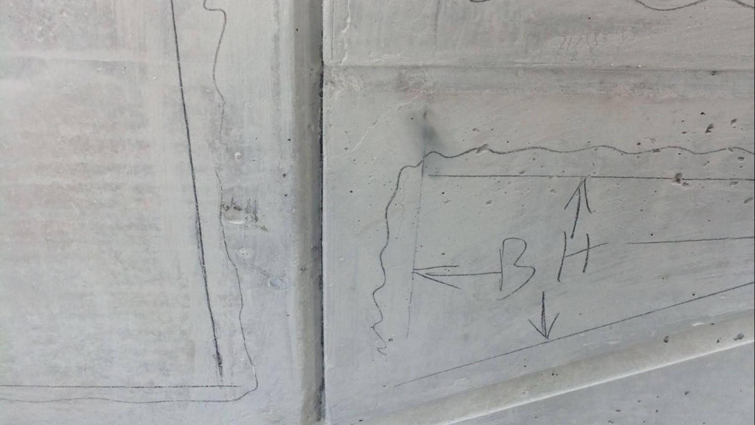 Cement marked with pencil.