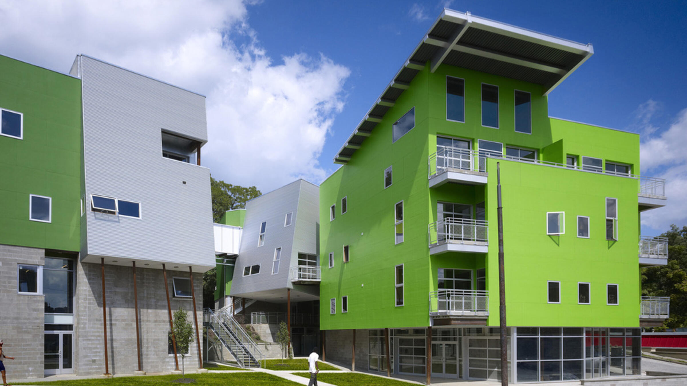 Glass Lofts (2007), a mixed-use building published in "ArchDaily."