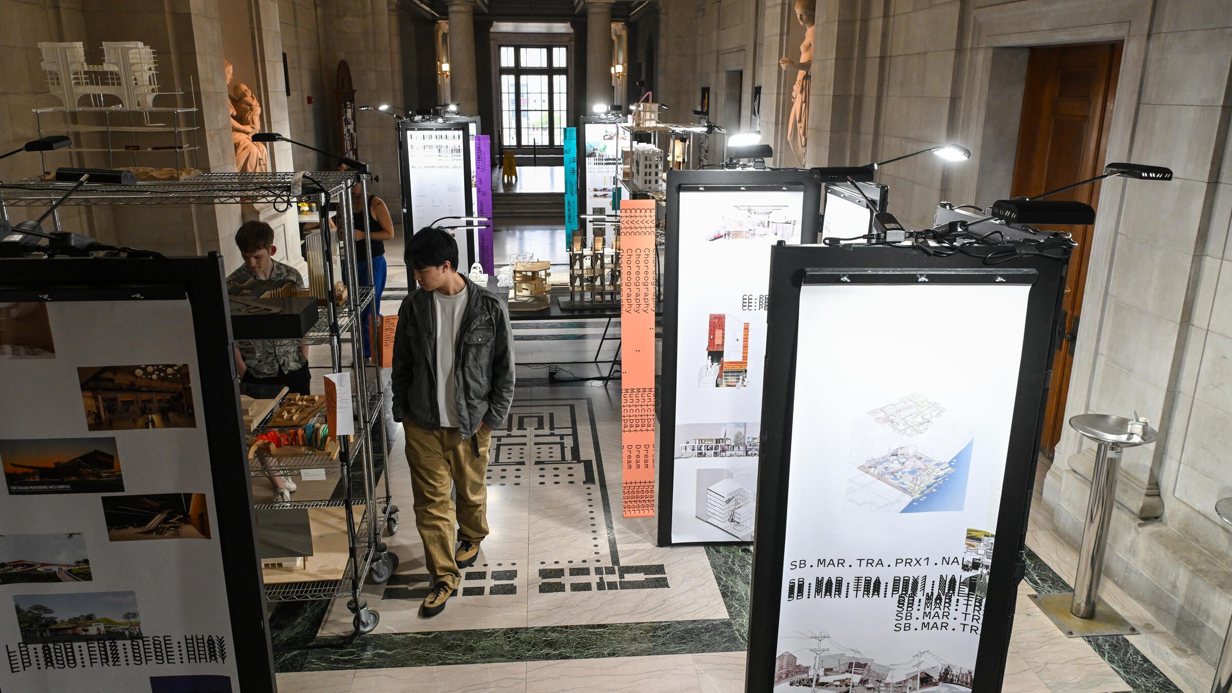 visitors in the great hall admire the exchange exhibition
