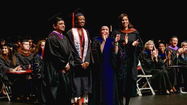 graduation participants onstage