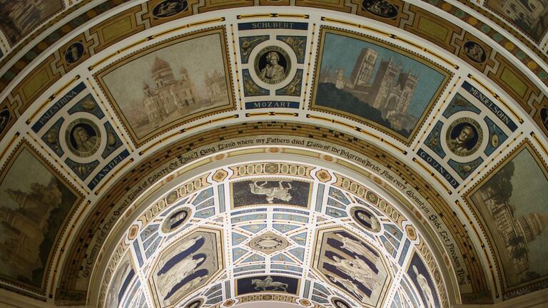 murals on the arched ceiling of the College of Fine Arts Great Hall