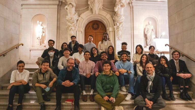 a group of people sitting on steps