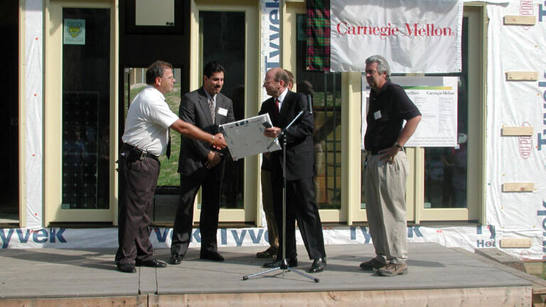 Solar Decathlon, Donner Ditch, 2002. President Cohon presiding at the completion event.