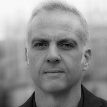 black and white photo of person wearing black jacket
