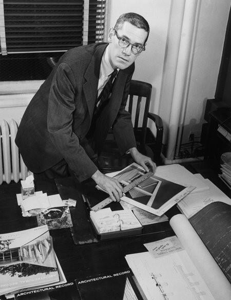 John Knox Shear. Image courtesy of the Carnegie Mellon University Architecture Archives. architect in glasses and ruler working on a publication
