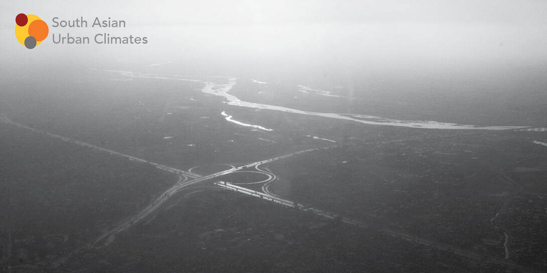black and white image of a river from afar