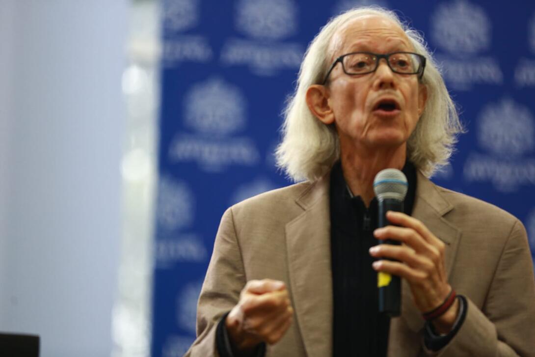 Arturo Escobar speaking at an event