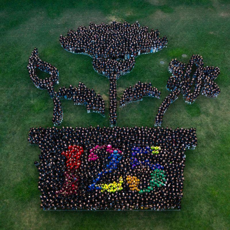 Fall 2025 Orientation Leaders Nathan Cottrell (B.Arch ’27) and Zoe Botta (B.Arch ’27), helped bring the vision to life for this year’s class photo reflecting the orientation theme "Rooted in Passion." Image: Carnegie Mellon University.