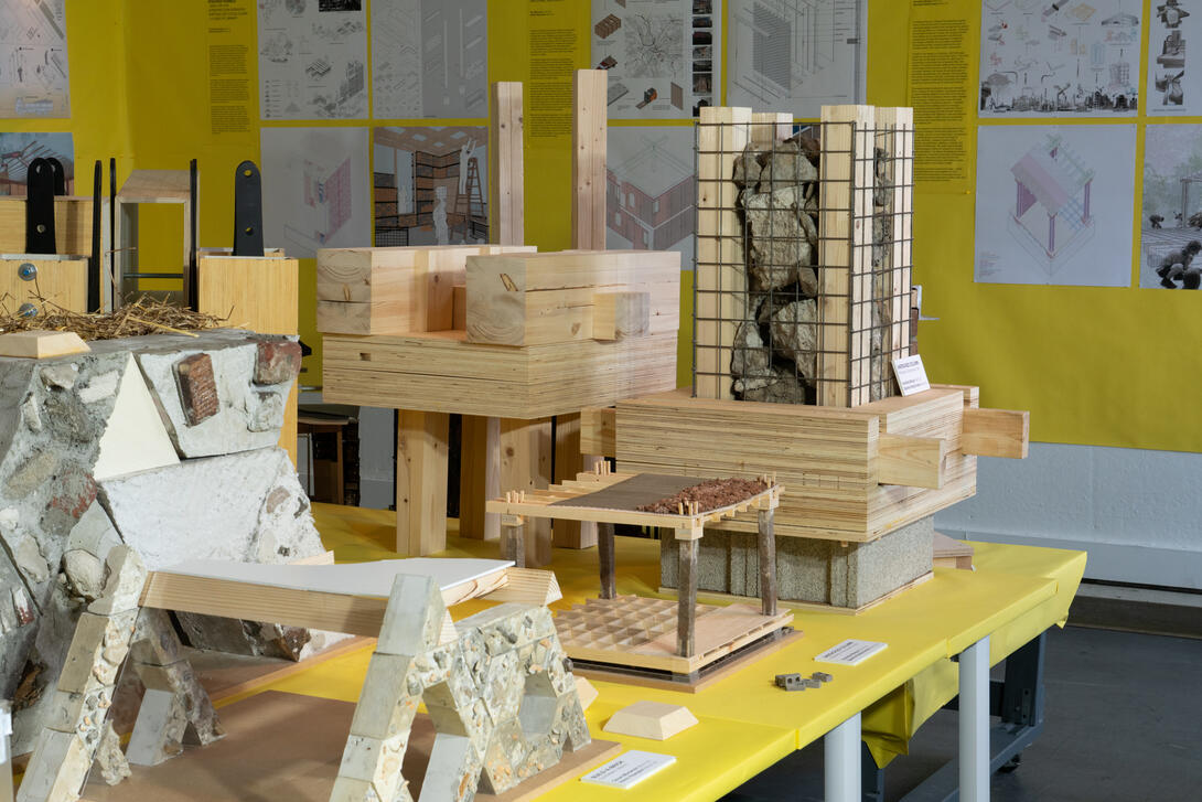 works on a table in an exhibition