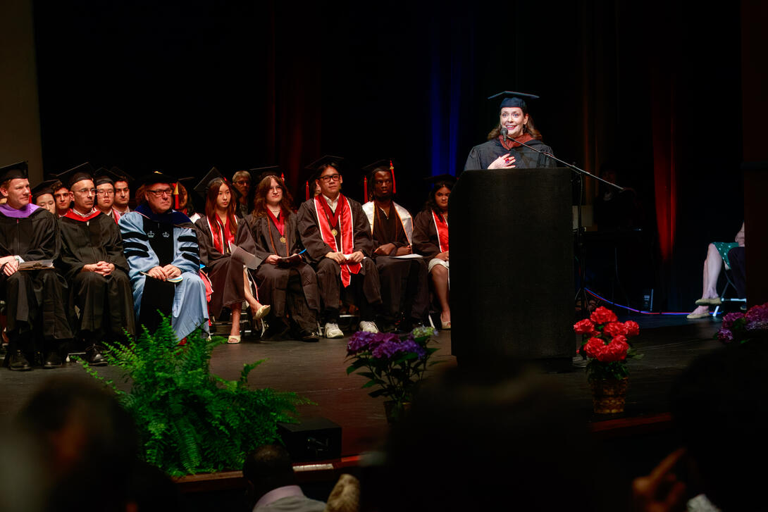 Rachel Zsembery (B.Arch '00) addresses the graduating class of undergraduate students as the 2026 Architecture Diploma Ceremony alumni speaker. Credit: Long Q Hong